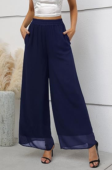 Dam vida skurna chiffontroser med elastisk midja och höga sidofickor Mirla-Eva Jonsson