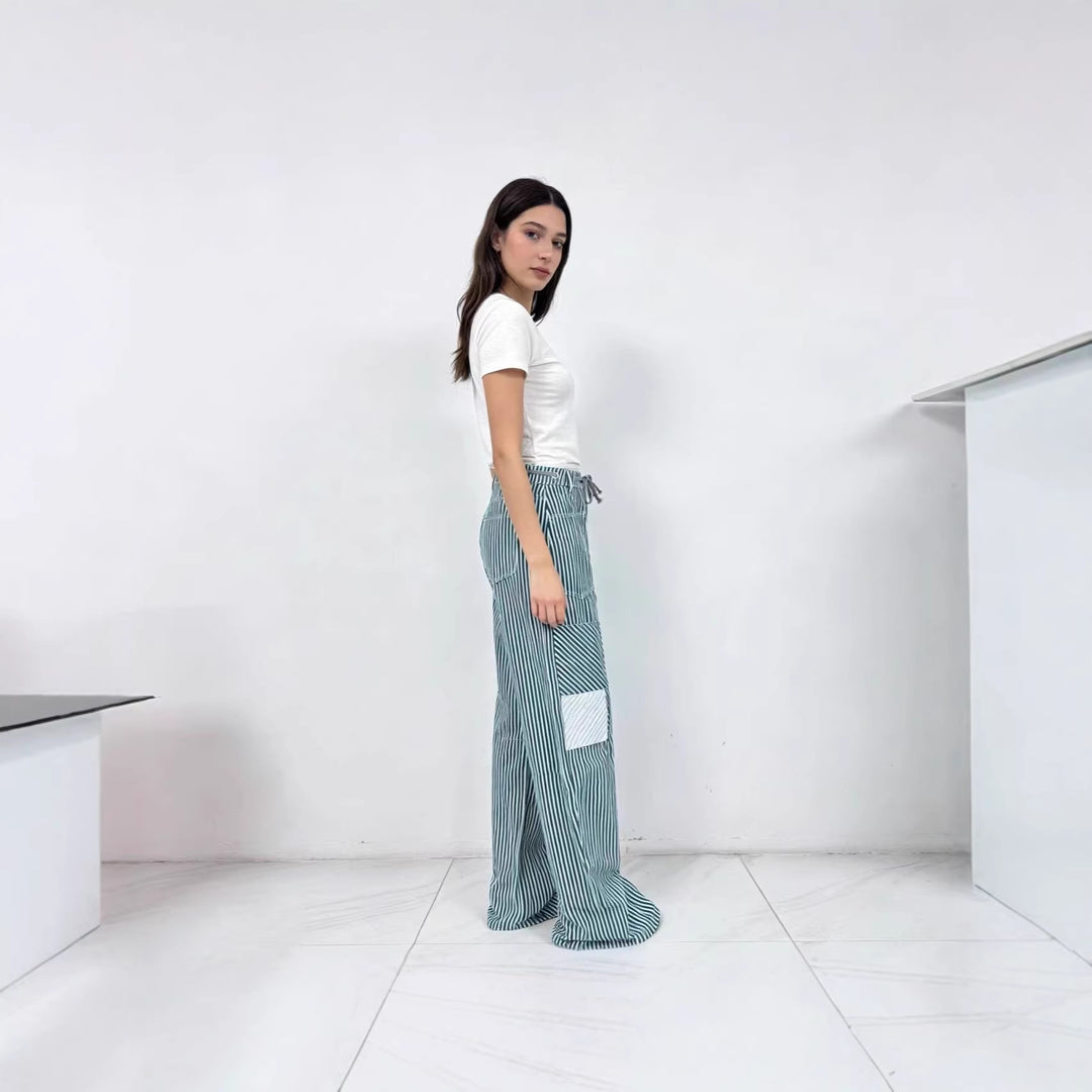 Dam wide cargo pants with practical pockets and unique design Mirla-Eva Jonsson
