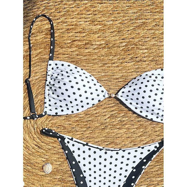 Dam women triangle bikini with playful polka dot pattern and elegant accents Mirla-Eva Jonsson