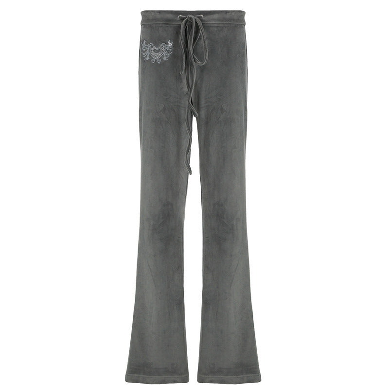 DamSweatpants i avslappnad Flared-design med trendiga broderier Mirla-Eva Jonsson