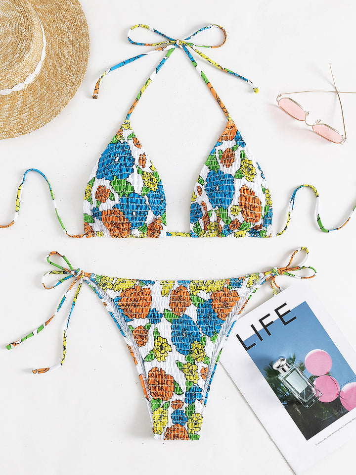 Dama triangeln-bikini med strukturerad yta och florala accenter Mirla-Eva Jonsson