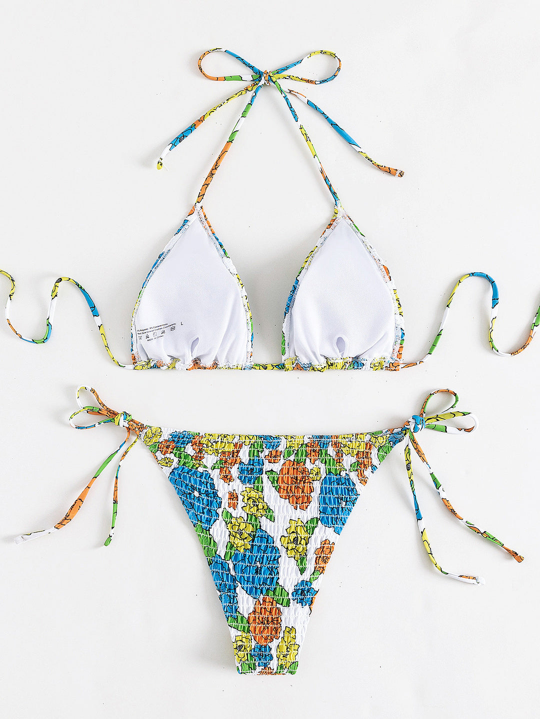 Dama triangeln-bikini med strukturerad yta och florala accenter Mirla-Eva Jonsson
