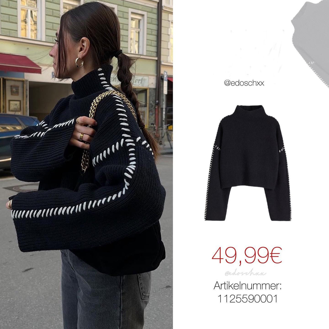 Damarnas stiliga stickade tröja med höga ärmar och dekorativ kontrastsöm Mirla-Eva Jonsson