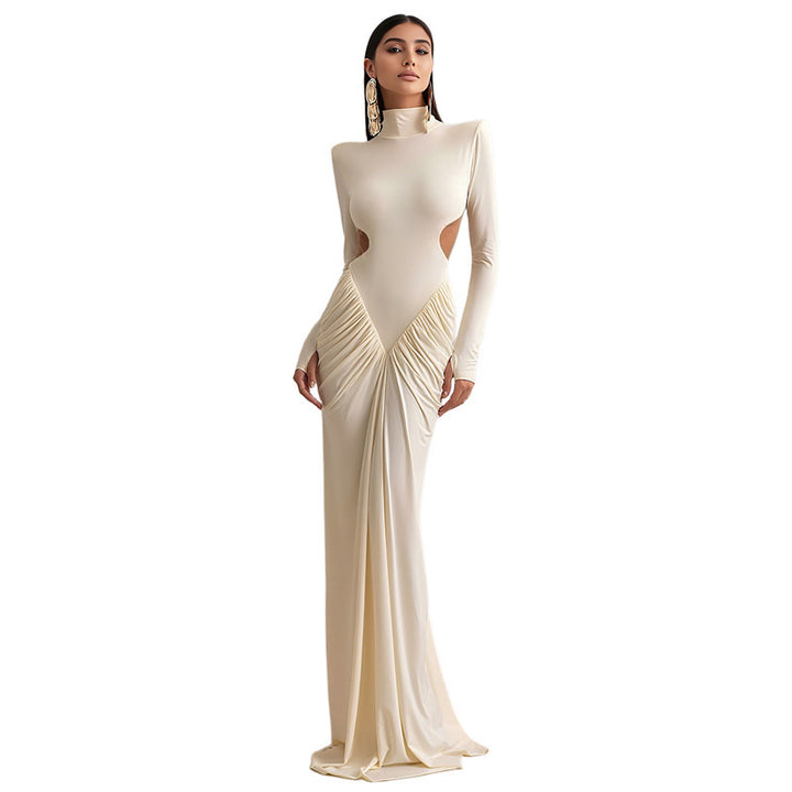 Damars Elegant Maxidress med djup ryggöppning och raffinerade draperingar Mirla-Eva Jonsson