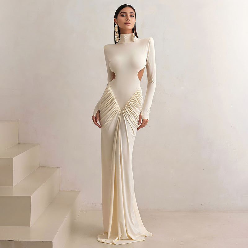 Damars Elegant Maxidress med djup ryggöppning och raffinerade draperingar Mirla-Eva Jonsson