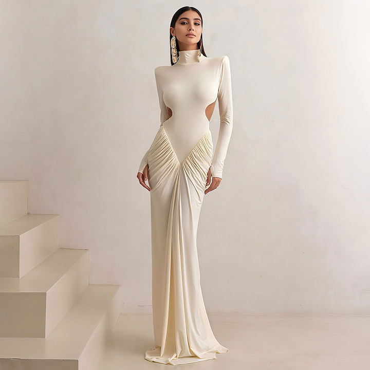 Damars Elegant Maxidress med djup ryggöppning och raffinerade draperingar Mirla-Eva Jonsson