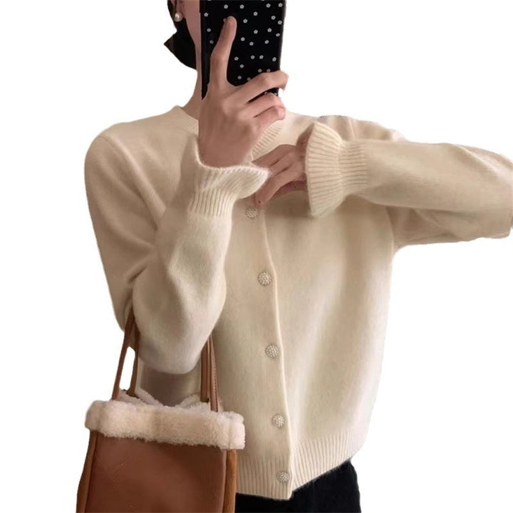 Damars mysiga cardigans med elegant pärnkknappstängning Mirla-Eva Jonsson