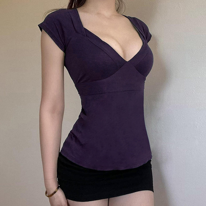 Damask wrap top with decorative tie bands and modern V-neck Mirla-Eva Jonsson