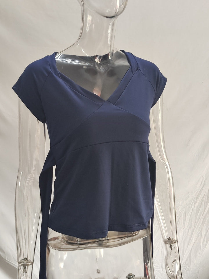 Damask wrap top with decorative tie bands and modern V-neck Mirla-Eva Jonsson