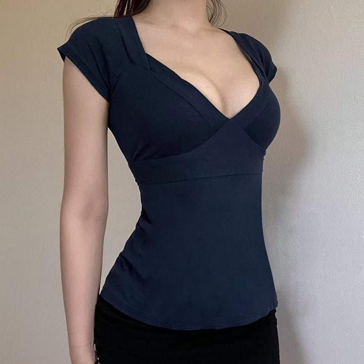 Damask wrap top with decorative tie bands and modern V-neck Mirla-Eva Jonsson