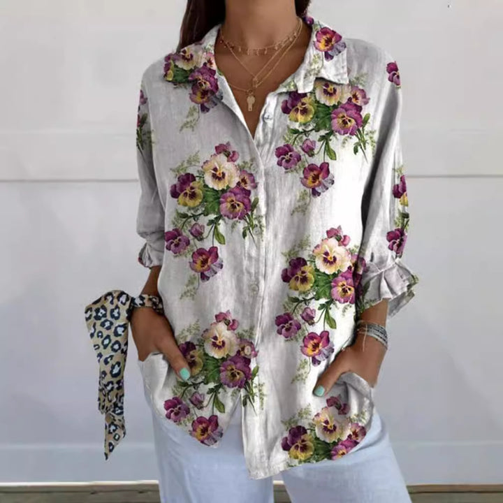 Damblus med blommönster och dold knäppning Mirla-Eva Jonsson