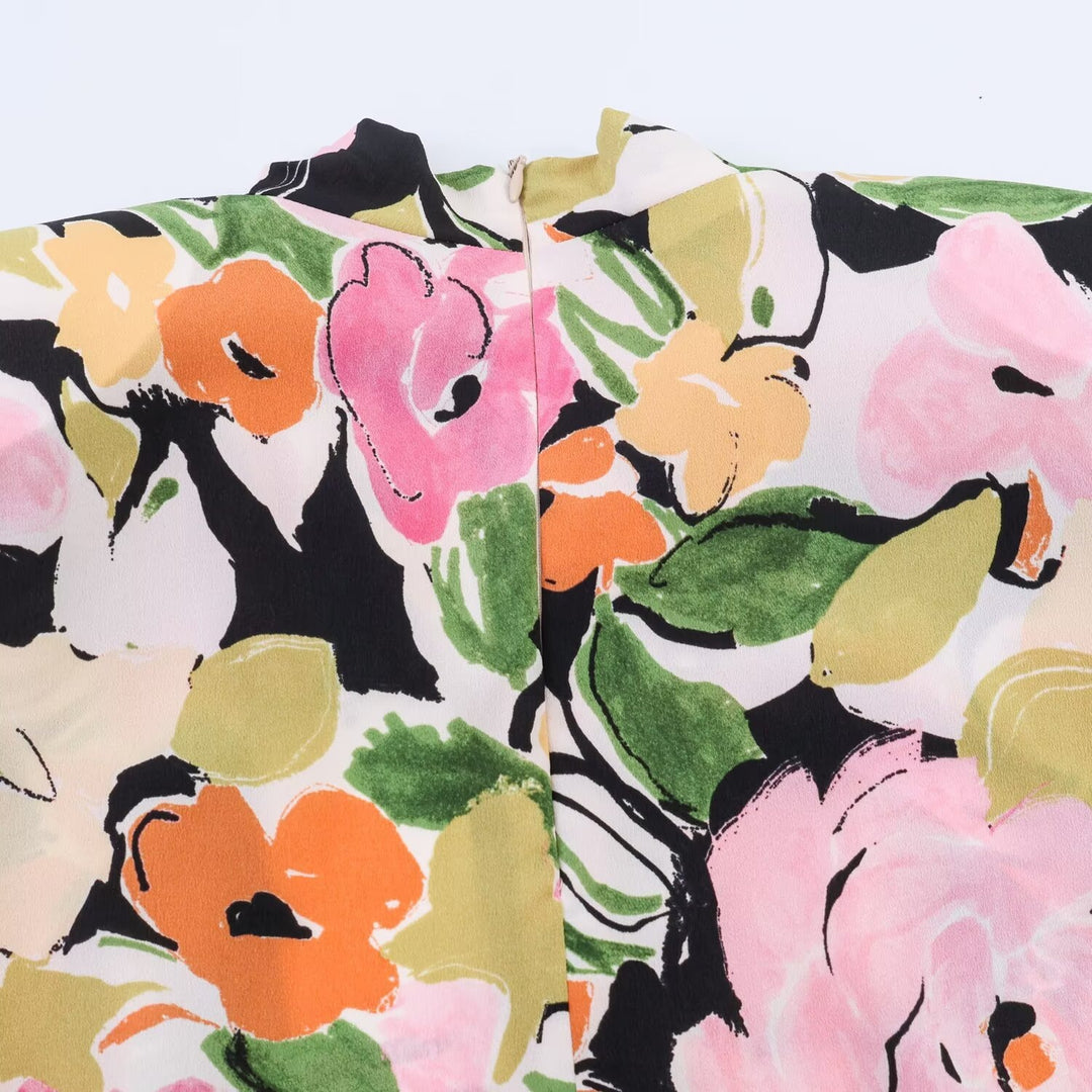 Damblus med blommönster och elegant knut Mirla-Eva Jonsson