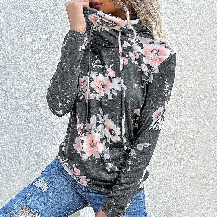 Damblus med blommönster och modern hoodie-utsnitt Mirla-Eva Jonsson