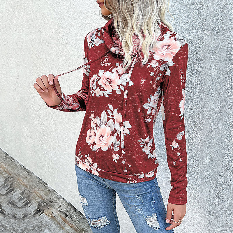 Damblus med blommönster och modern hoodie-utsnitt Mirla-Eva Jonsson