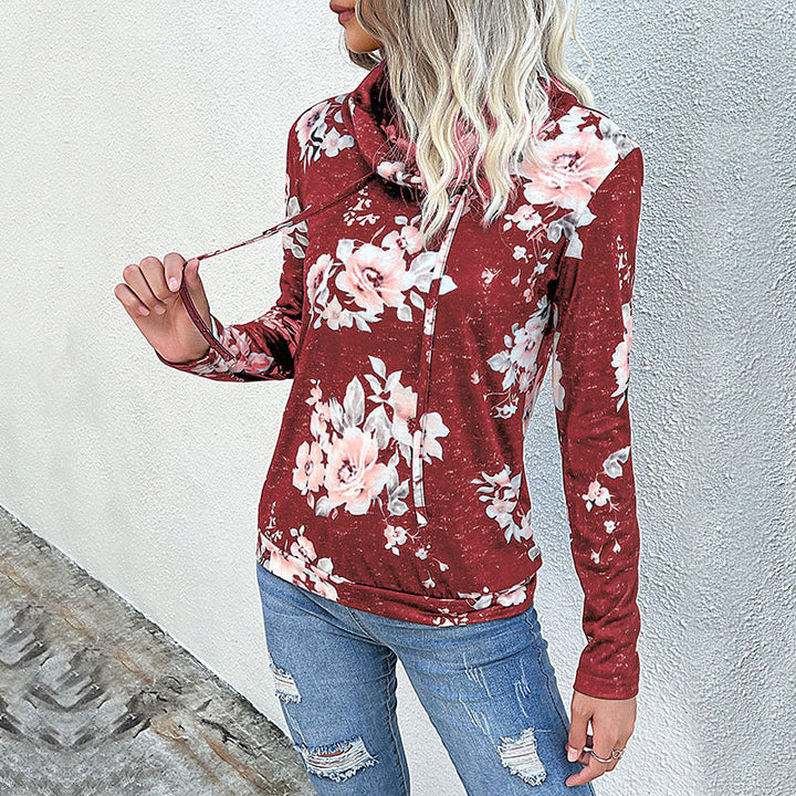 Damblus med blommönster och modern hoodie-utsnitt Mirla-Eva Jonsson
