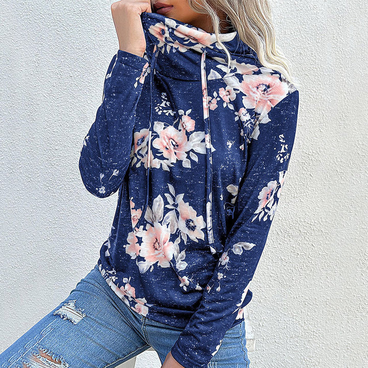 Damblus med blommönster och modern hoodie-utsnitt Mirla-Eva Jonsson