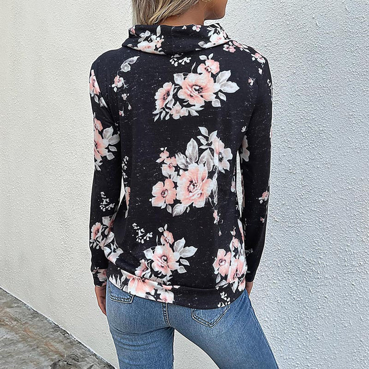 Damblus med blommönster och modern hoodie-utsnitt Mirla-Eva Jonsson