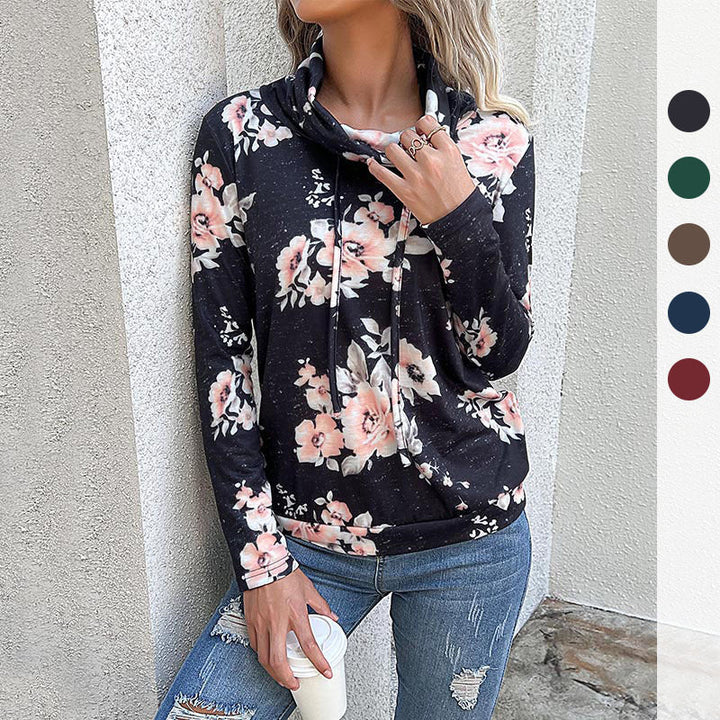 Damblus med blommönster och modern hoodie-utsnitt Mirla-Eva Jonsson