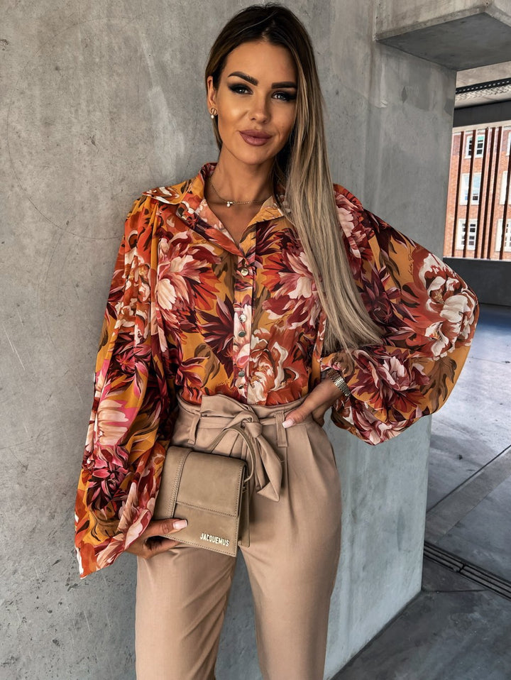 Damblus med blommönster och voluminösa ärmar Mirla-Eva Jonsson