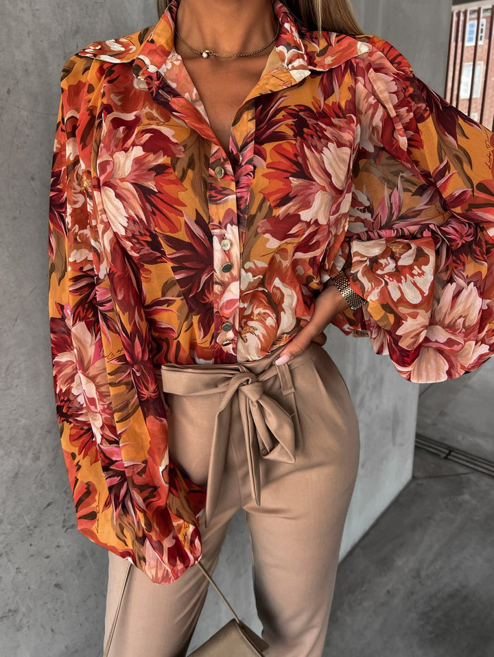 Damblus med blommönster och voluminösa ärmar Mirla-Eva Jonsson