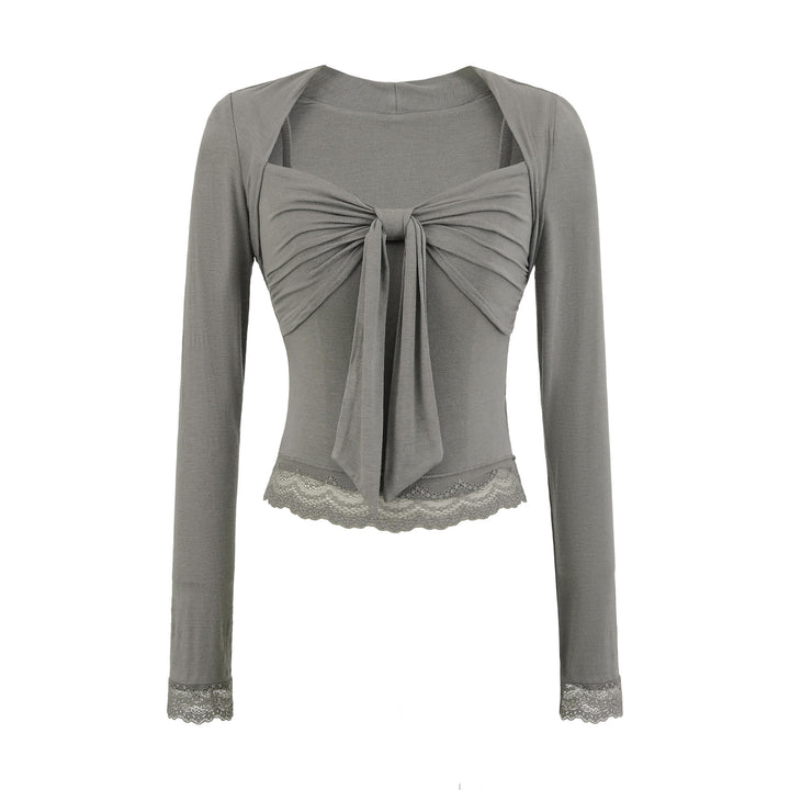 Damblus med dekorativt slips-design Mirla-Eva Jonsson