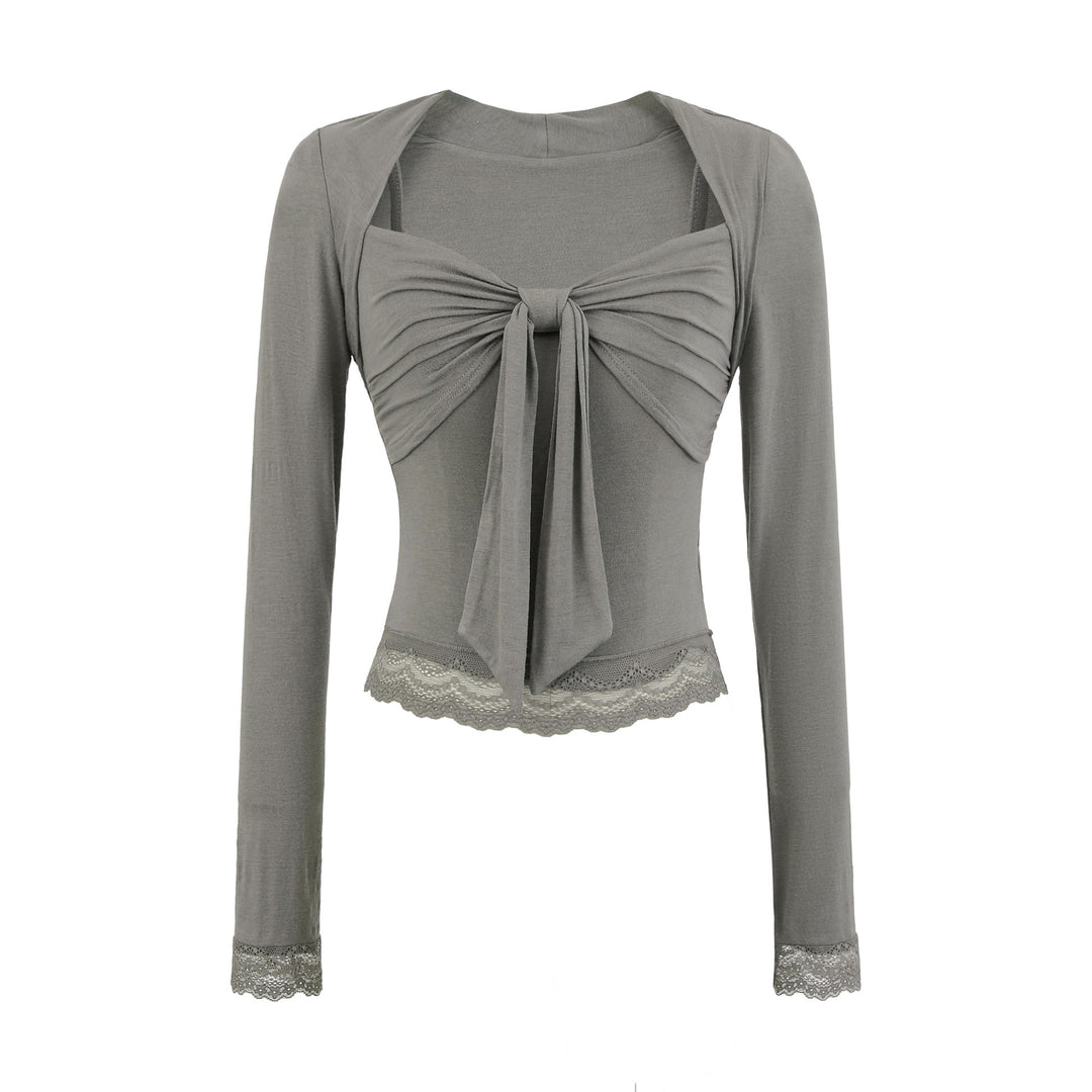 Damblus med dekorativt slips-design Mirla-Eva Jonsson