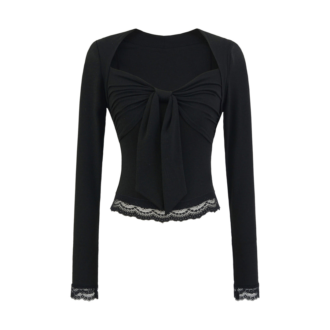 Damblus med dekorativt slips-design Mirla-Eva Jonsson
