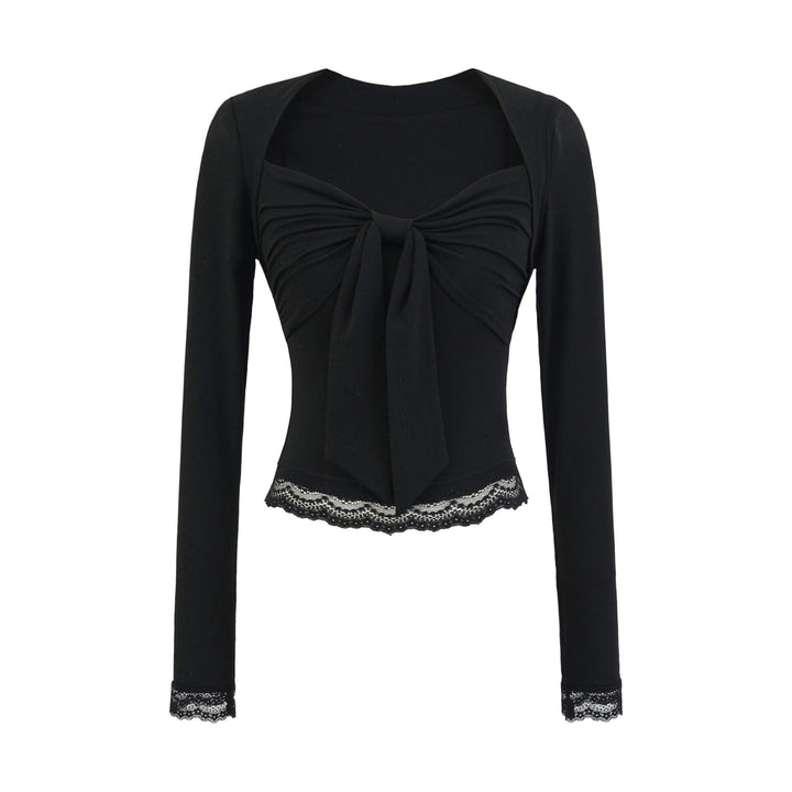 Damblus med dekorativt slips-design Mirla-Eva Jonsson