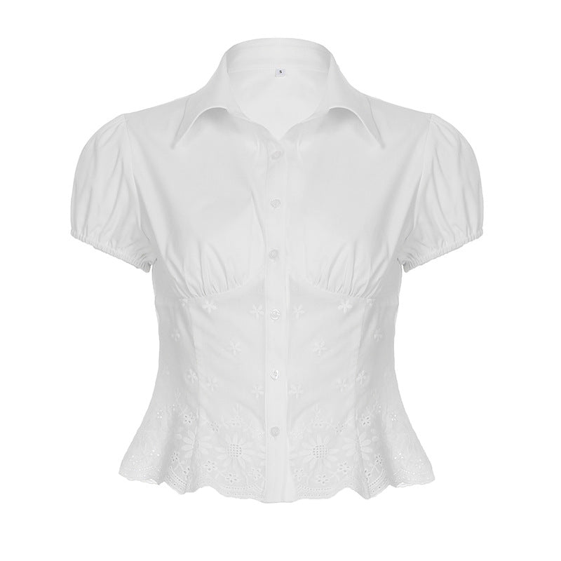 Damblus med elegant spetsdekoration och puffärmar Mirla-Eva Jonsson