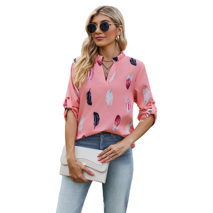 Damblus med eleganta fjädermönster och halvlånga ärmar Mirla-Eva Jonsson
