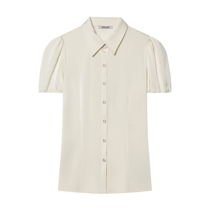 Damblus med korta puffärmar och elegant knapprad Mirla-Eva Jonsson