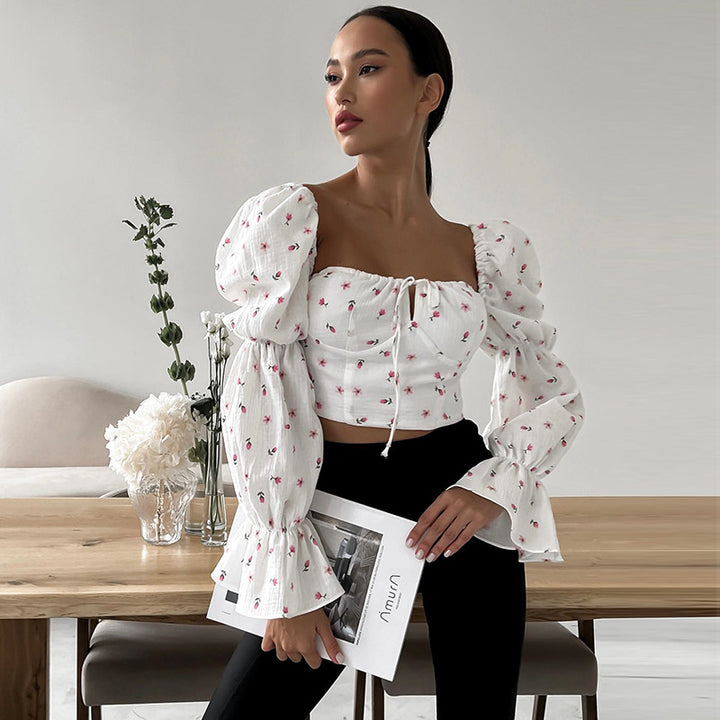 Damblus med puffärmar och blommönster Mirla-Eva Jonsson