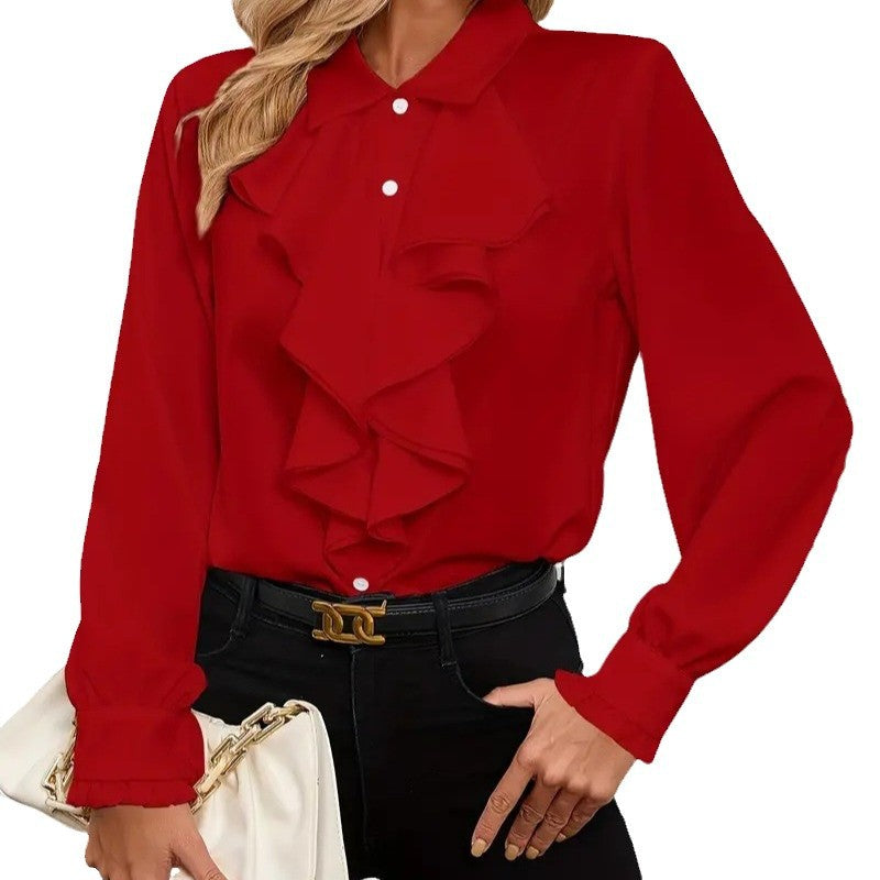 Damblus med raffinerade ruffledetaljer och eleganta ärmar Mirla-Eva Jonsson