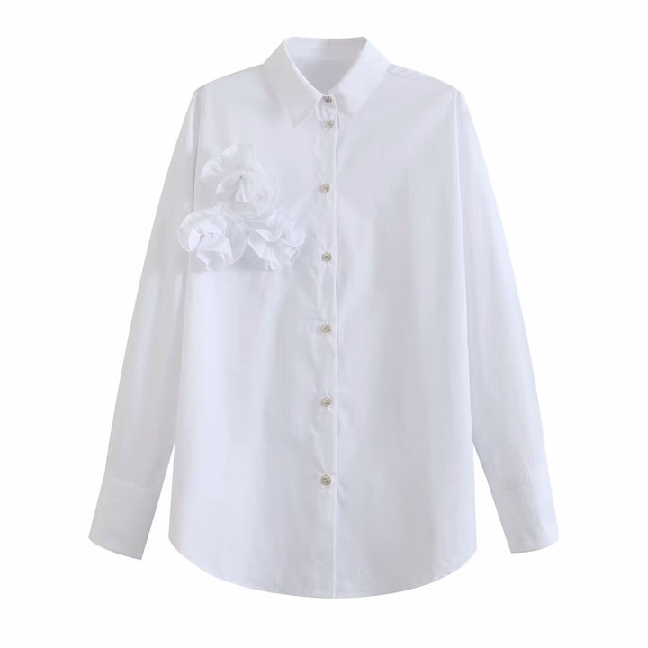 Damblus med strukturerade volanger Mirla-Eva Jonsson