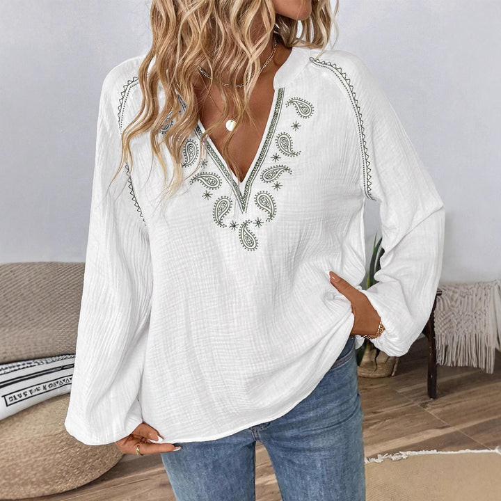 Damblus med utsmyckade paisleymönster och eleganta ärmar Mirla-Eva Jonsson