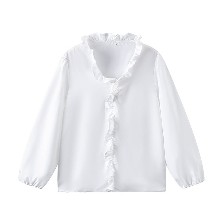 Damblus med volangdetaljer och elegant ståkrage Mirla-Eva Jonsson