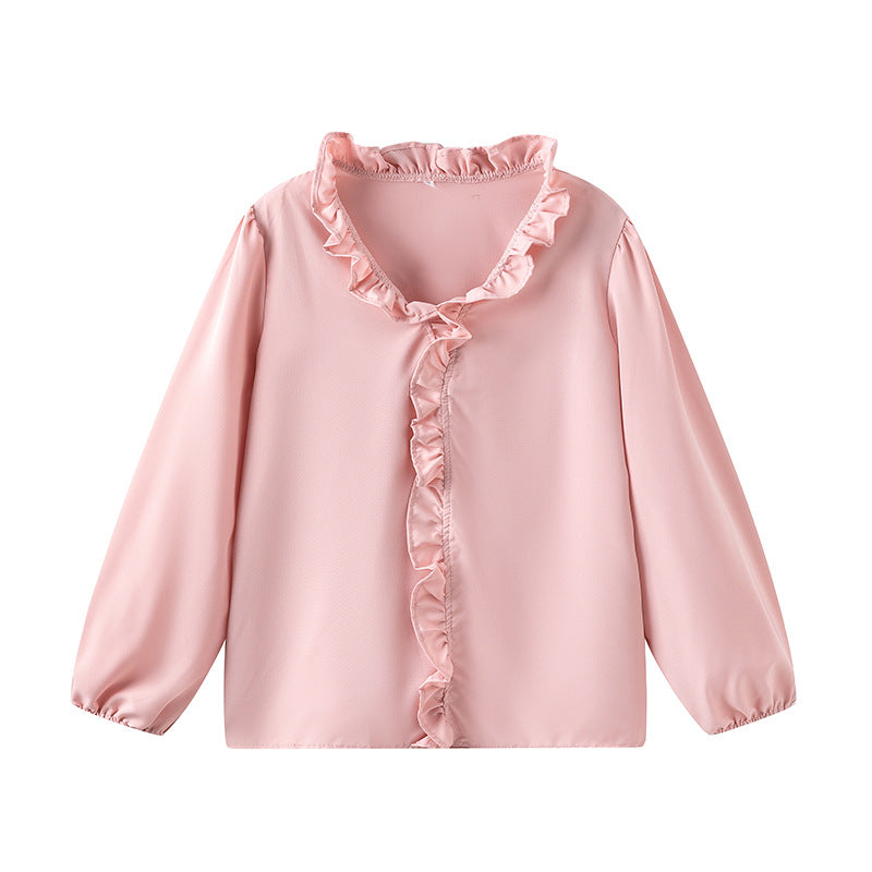 Damblus med volangdetaljer och elegant ståkrage Mirla-Eva Jonsson