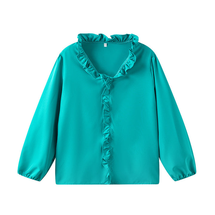 Damblus med volangdetaljer och elegant ståkrage Mirla-Eva Jonsson