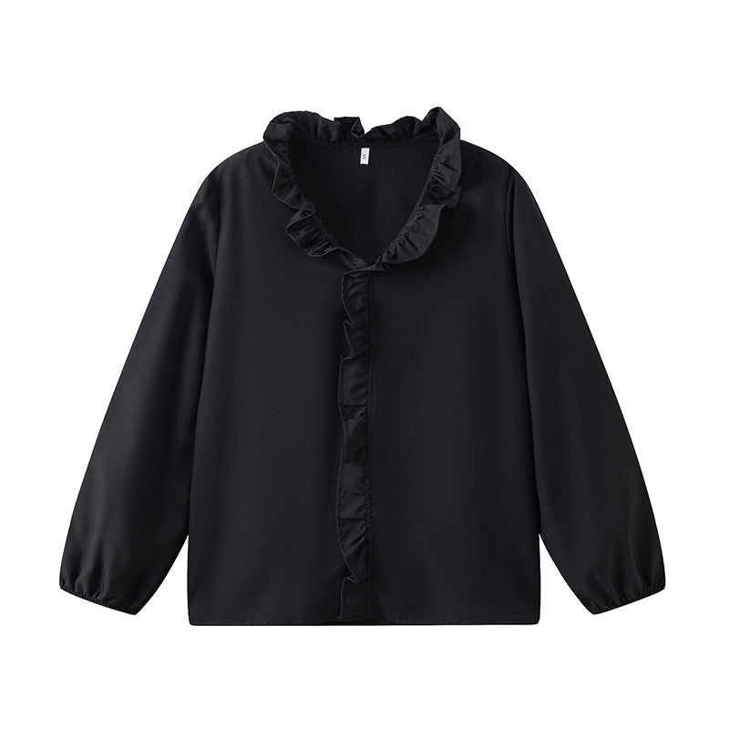 Damblus med volangdetaljer och elegant ståkrage Mirla-Eva Jonsson