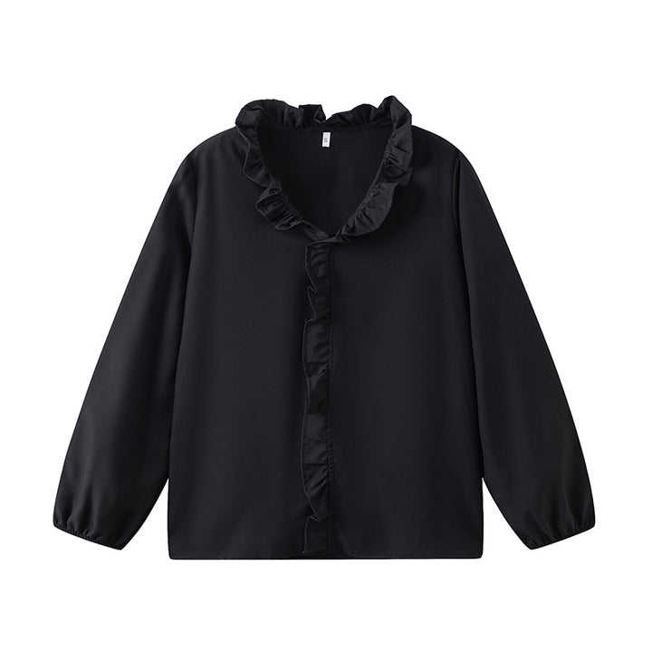 Damblus med volangdetaljer och elegant ståkrage Mirla-Eva Jonsson