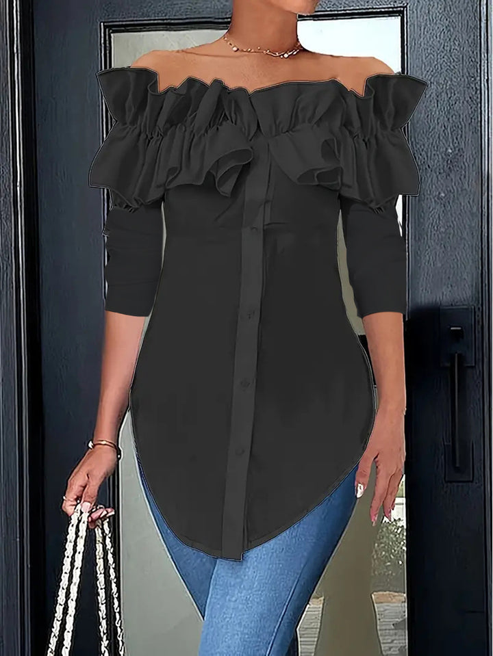 Damblus med volangdetaljer och off-shoulder passform Mirla-Eva Jonsson