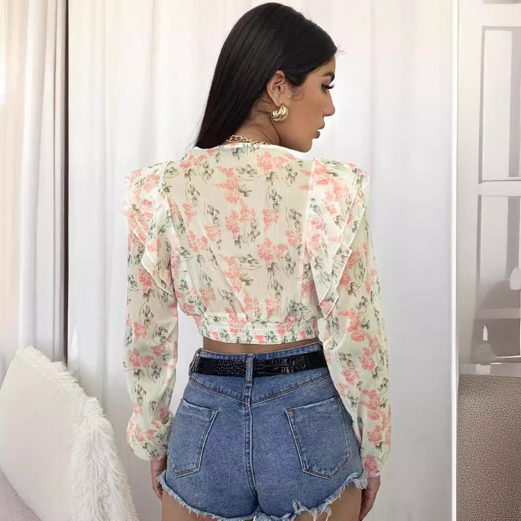 Damblus med volanger och blommig design Mirla-Eva Jonsson