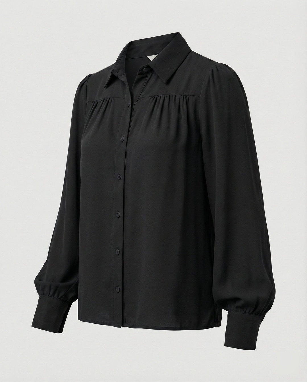 Damblus med voluminösa ärmar och eleganta volangdetaljer-Eva Jonsson