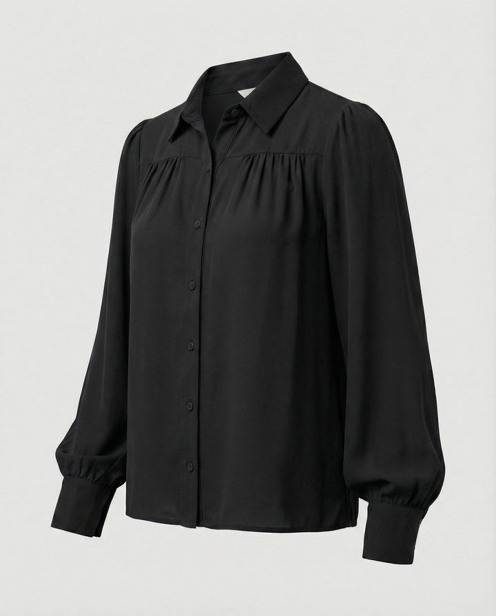 Damblus med voluminösa ärmar och eleganta volangdetaljer-Eva Jonsson