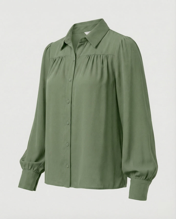 Damblus med voluminösa ärmar och eleganta volangdetaljer-Eva Jonsson