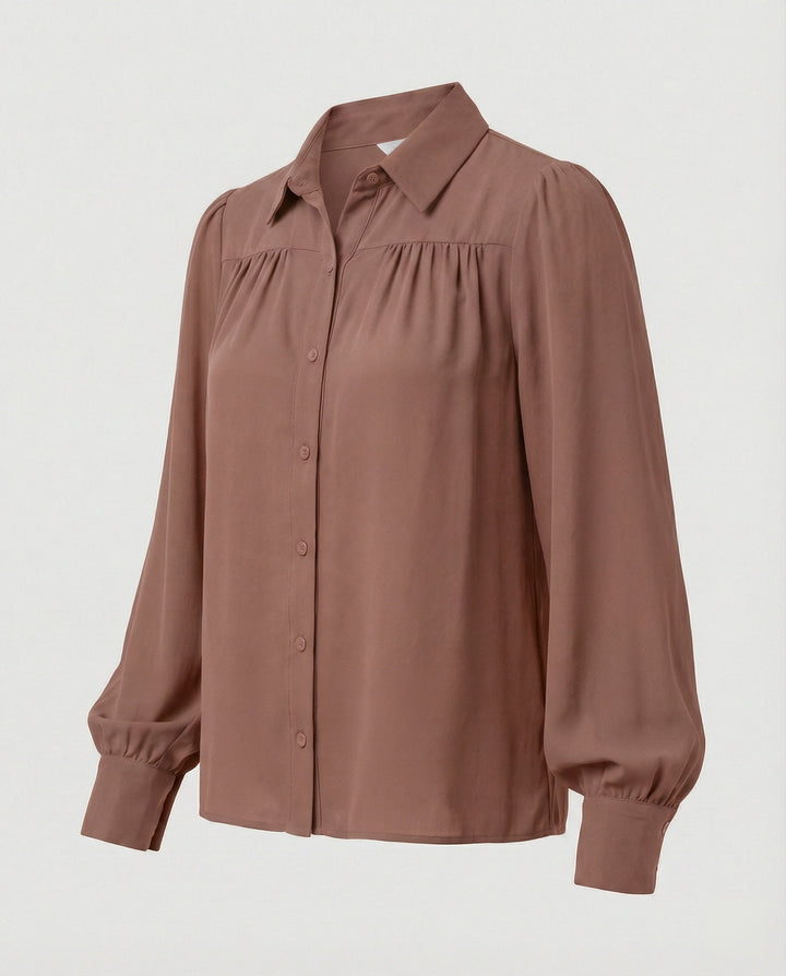 Damblus med voluminösa ärmar och eleganta volangdetaljer-Eva Jonsson