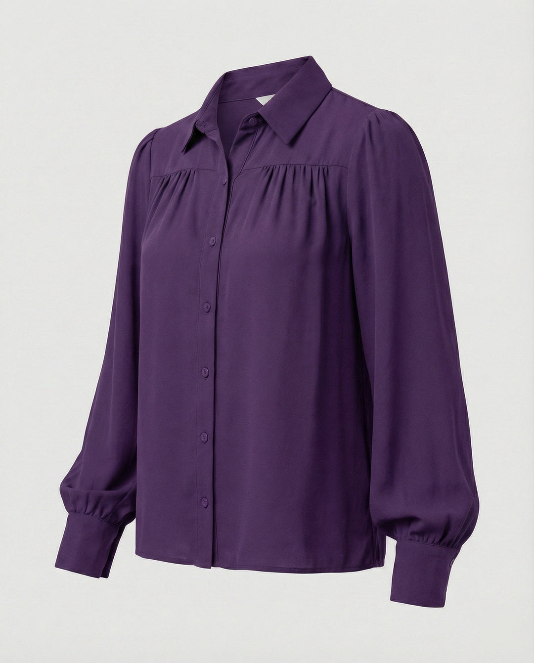 Damblus med voluminösa ärmar och eleganta volangdetaljer-Eva Jonsson