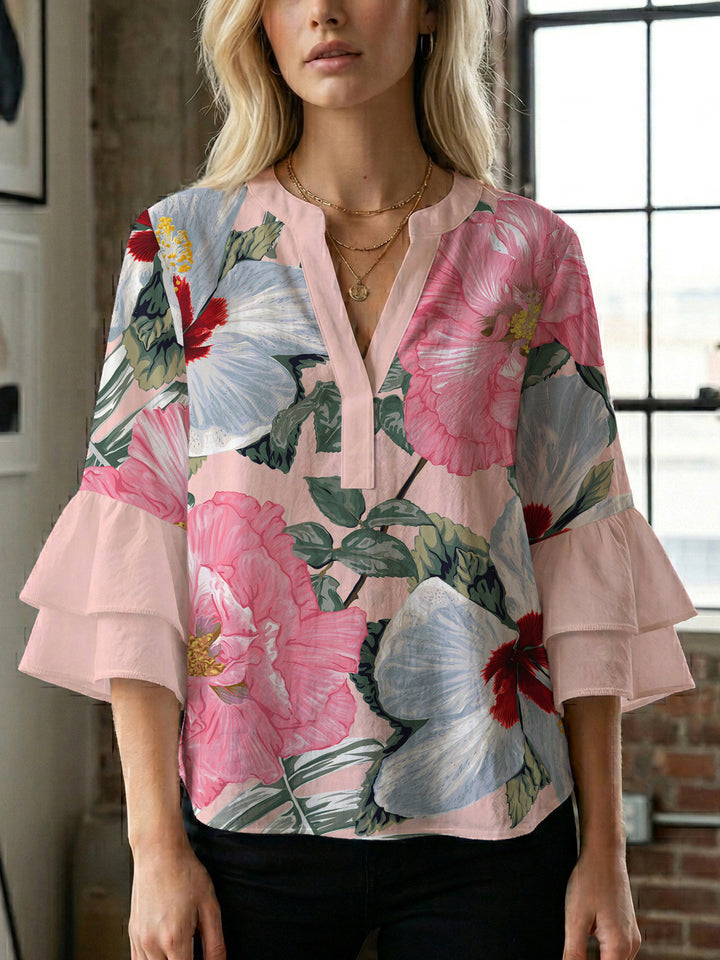 Damblus med voluminösa prickiga ärmar och blommönster Mirla-Eva Jonsson