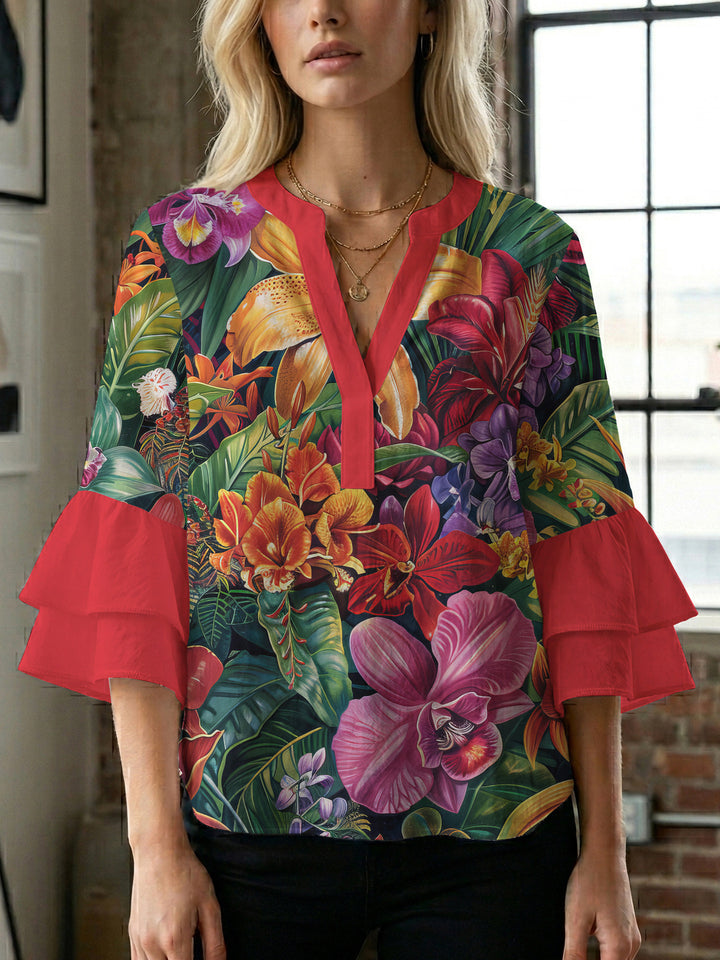 Damblus med voluminösa prickiga ärmar och blommönster Mirla-Eva Jonsson