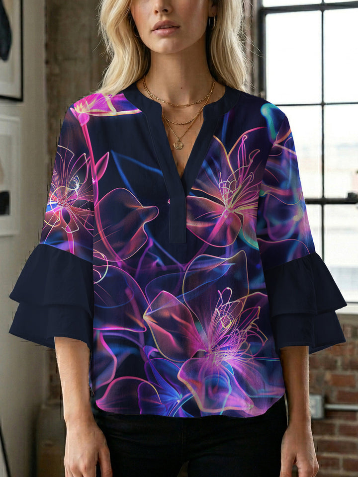 Damblus med voluminösa prickiga ärmar och blommönster Mirla-Eva Jonsson